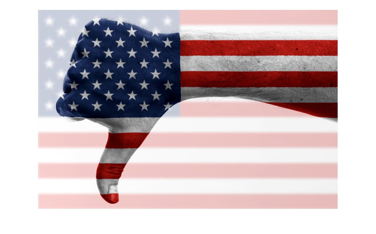 thumb down with digitally body-painted us flag